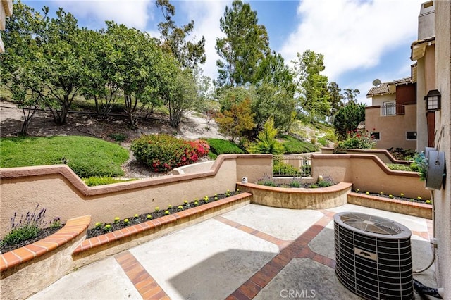 view of patio with central AC