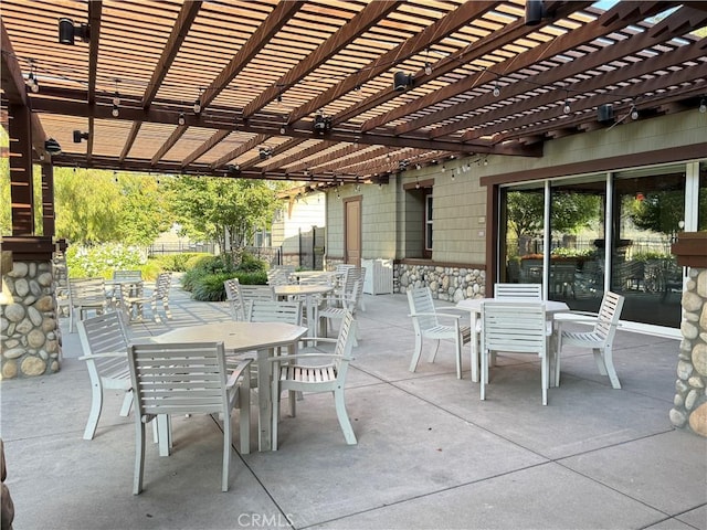 11151 Tesota Loop St, Corona, CA 92883 - view of patio featuring outdoor dining area and a pergola