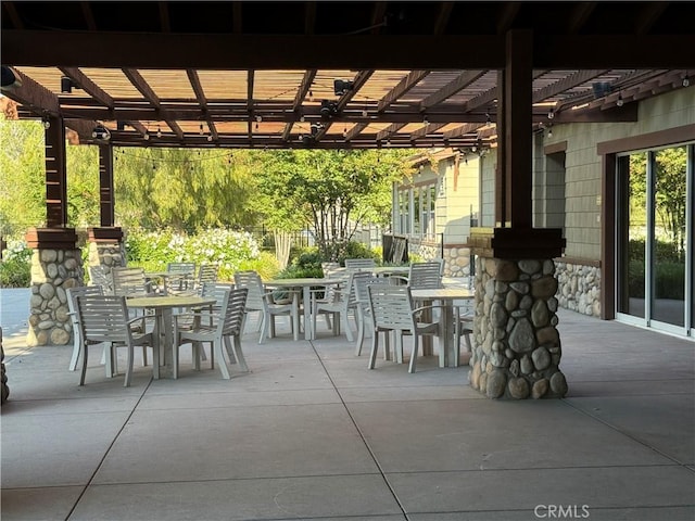11151 Tesota Loop St, Corona, CA 92883 - view of patio with outdoor dining area and a pergola