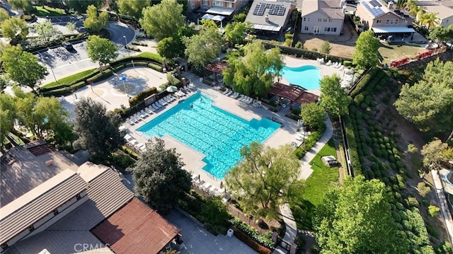 view of property location with a pool