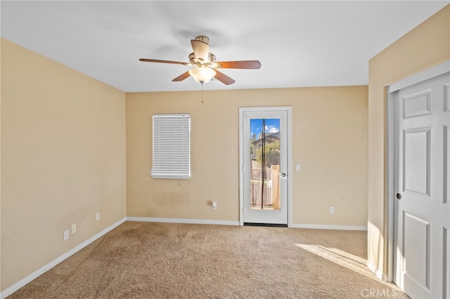 11151 Tesota Loop St, Corona, CA 92883 - carpeted empty room with a ceiling fan and baseboards