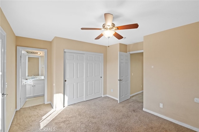 11151 Tesota Loop St, Corona, CA 92883 - unfurnished bedroom with carpet flooring, a sink, baseboards, a closet, and connected bathroom