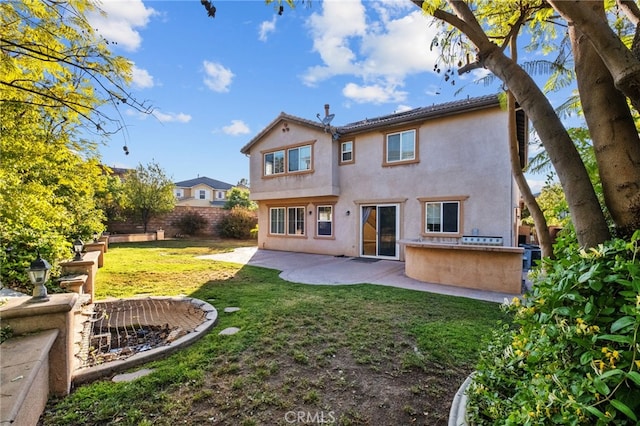 11151 Tesota Loop St, Corona, CA 92883 - rear view of house with a patio area and stucco siding