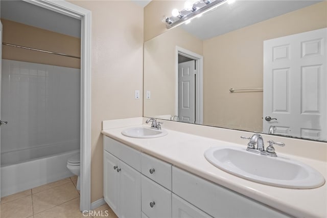 full bath featuring toilet, tile patterned floors, double vanity, and shower / bathtub combination