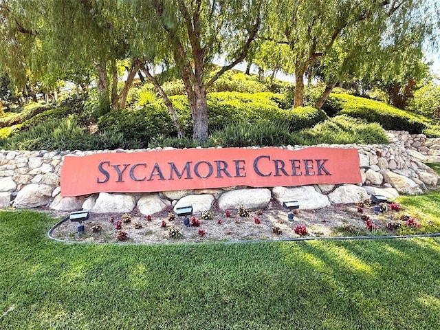11151 Tesota Loop St, Corona, CA 92883 - community sign with a lawn