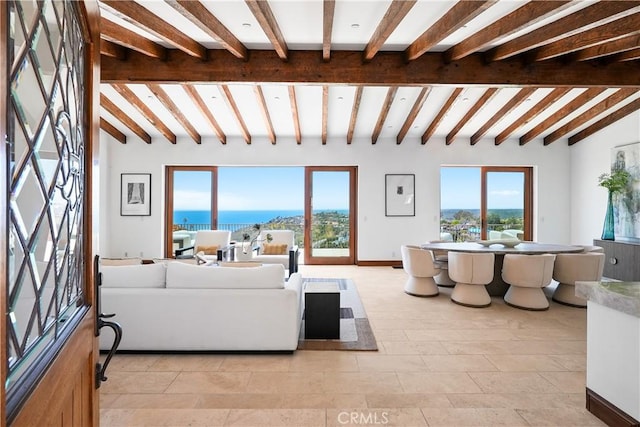 2516 Temple Hills Dr, Laguna Beach, CA 92651 - living room with plenty of natural light, a water view, light tile patterned flooring, and baseboards