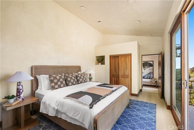 2516 Temple Hills Dr, Laguna Beach, CA 92651 - bedroom with vaulted ceiling, wood finished floors, and a closet