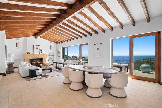 2516 Temple Hills Dr, Laguna Beach, CA 92651 - dining room with a water view and a glass covered fireplace