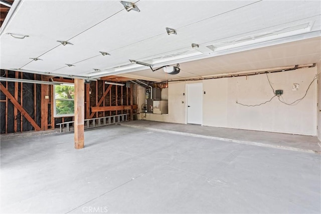5431 Via Ontiveros, Yorba Linda, CA 92887 - garage with heating unit and a garage door opener