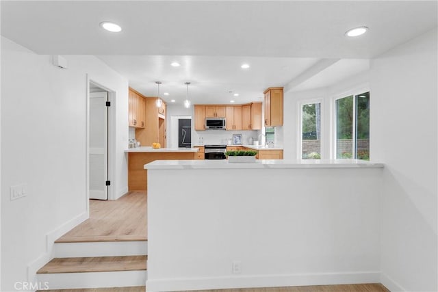 5431 Via Ontiveros, Yorba Linda, CA 92887 - kitchen featuring baseboards, recessed lighting, light countertops, and appliances with stainless steel finishes