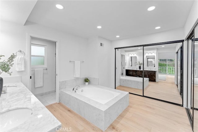 5431 Via Ontiveros, Yorba Linda, CA 92887 - bathroom featuring a healthy amount of sunlight, double vanity, a sink, and visible vents