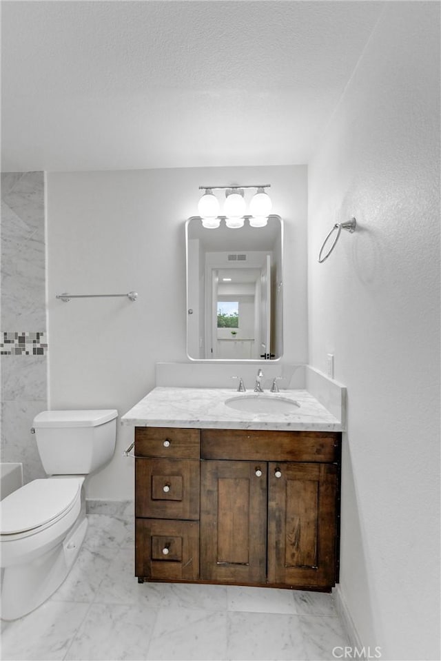 5431 Via Ontiveros, Yorba Linda, CA 92887 - bathroom featuring a tub, vanity, toilet, and marble finish floor