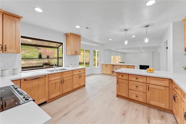 5431 Via Ontiveros, Yorba Linda, CA 92887 - kitchen with light wood finished floors, a sink, backsplash, light countertops, and recessed lighting