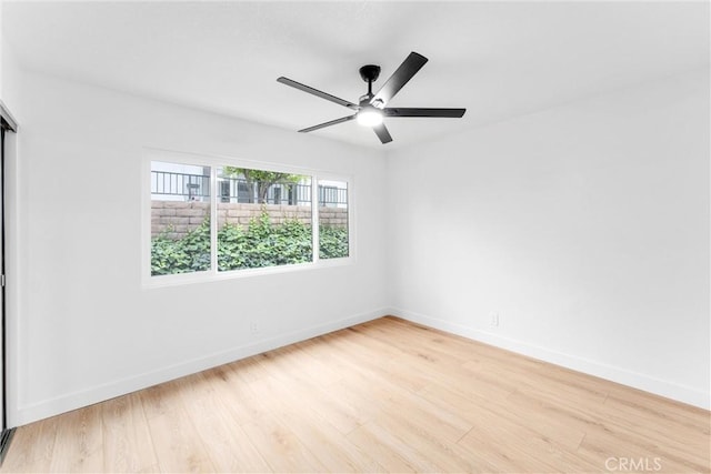5431 Via Ontiveros, Yorba Linda, CA 92887 - unfurnished room with ceiling fan, light wood-style flooring, and baseboards