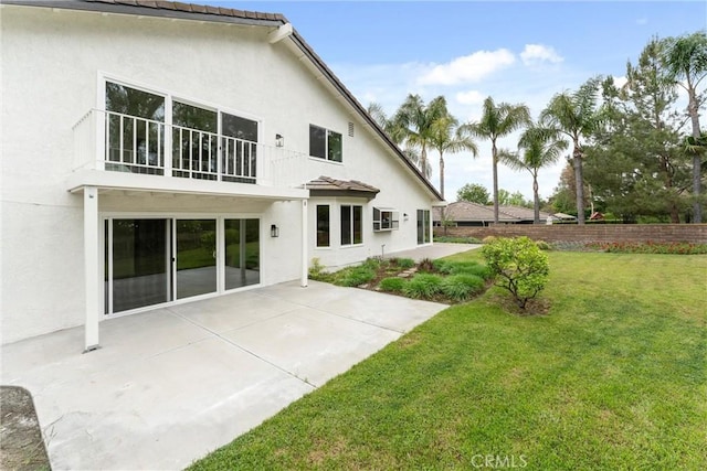 5431 Via Ontiveros, Yorba Linda, CA 92887 - rear view of property featuring a lawn, a patio area, and stucco siding