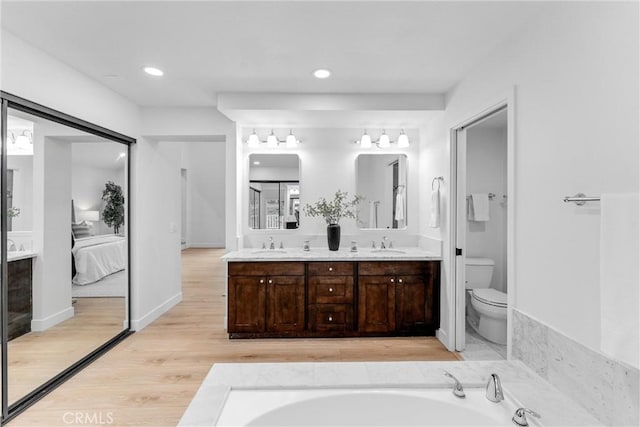 5431 Via Ontiveros, Yorba Linda, CA 92887 - bathroom featuring toilet, connected bathroom, double vanity, and a sink