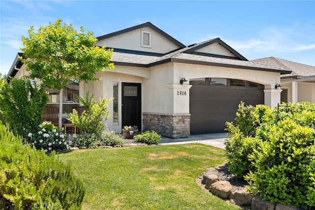craftsman inspired home with a front yard, stucco siding, a garage, and stone siding