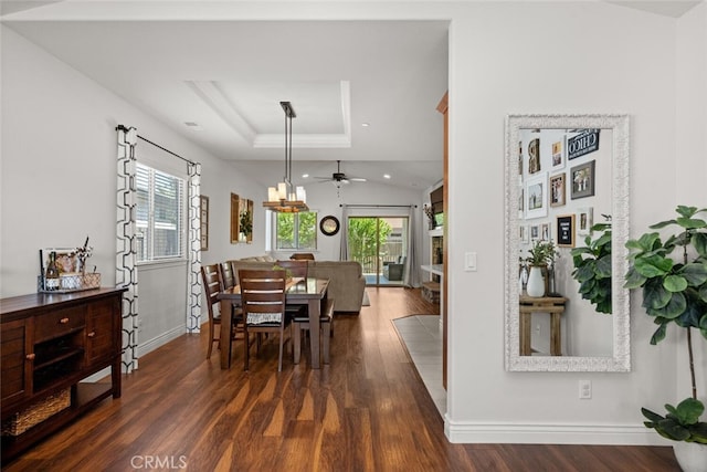 dining area with plenty of natural light, dark wood-type flooring, baseboards, and recessed lighting