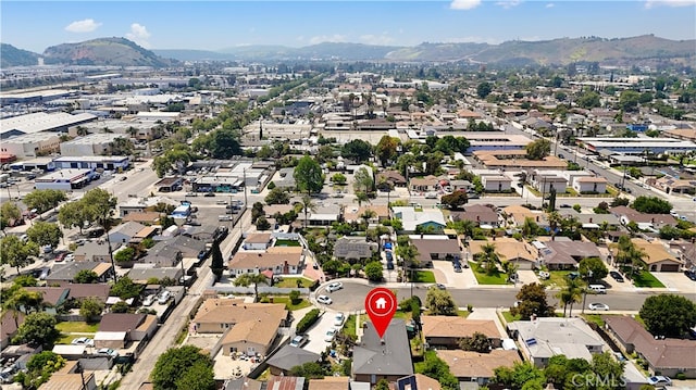 birds eye view of property featuring a residential view and a mountain view