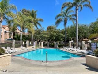 community pool with a patio