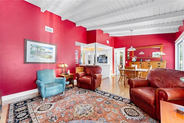 2245 Avenida Salvador, San Clemente, CA 92672 - living area featuring beamed ceiling, wood finished floors, and baseboards