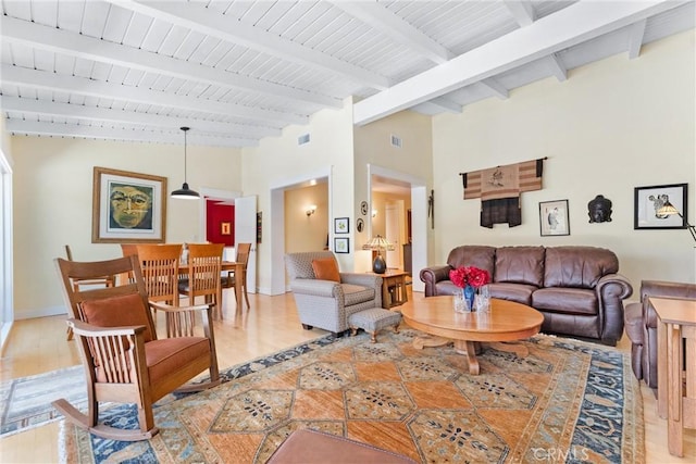 2245 Avenida Salvador, San Clemente, CA 92672 - living room featuring light wood-type flooring, beam ceiling, high vaulted ceiling, and baseboards