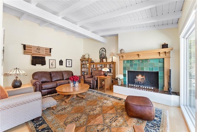 2245 Avenida Salvador, San Clemente, CA 92672 - living area with beamed ceiling, a tiled fireplace, and wood finished floors
