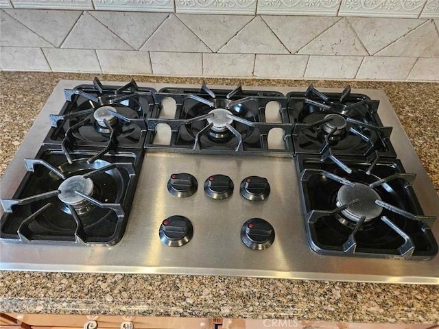 interior details featuring stainless steel gas cooktop
