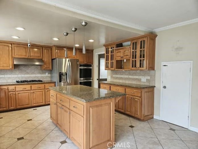 kitchen featuring under cabinet range hood, light tile patterned floors, stainless steel appliances, and tasteful backsplash