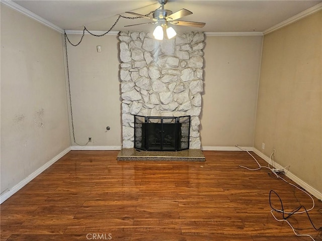 unfurnished living room featuring ornamental molding, ceiling fan, and wood finished floors