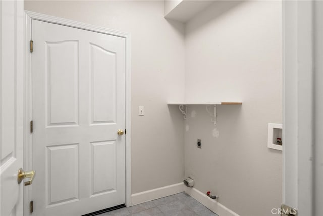 670 Grafton Park Dr, Chico, CA 95926 - laundry room featuring laundry area, light tile patterned flooring, gas dryer hookup, baseboards, and hookup for a washing machine