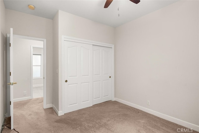 670 Grafton Park Dr, Chico, CA 95926 - unfurnished bedroom with baseboards, a closet, ceiling fan, and carpet floors
