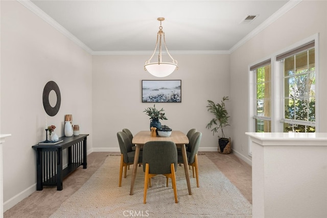 670 Grafton Park Dr, Chico, CA 95926 - dining room featuring baseboards, ornamental molding, visible vents, and light colored carpet