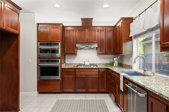 670 Grafton Park Dr, Chico, CA 95926 - kitchen with light tile patterned flooring, under cabinet range hood, appliances with stainless steel finishes, and a sink