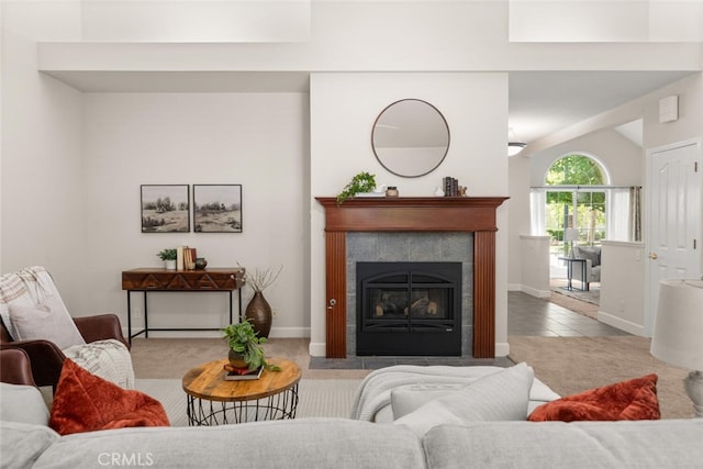 670 Grafton Park Dr, Chico, CA 95926 - living room featuring baseboards, a tile fireplace, carpet flooring, and tile patterned floors