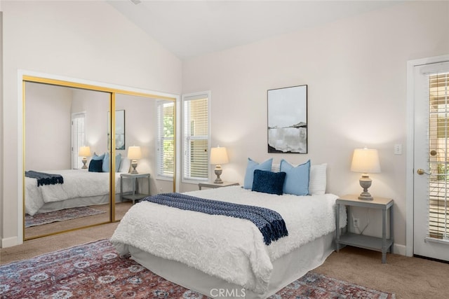 670 Grafton Park Dr, Chico, CA 95926 - carpeted bedroom with lofted ceiling, a closet, baseboards, and multiple windows