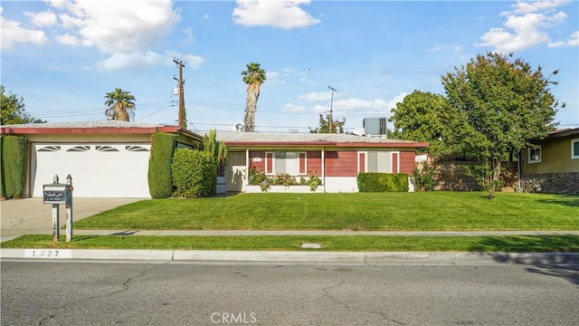 5427 Picker St, Riverside, CA 92503 - ranch-style home featuring driveway, a front yard, and a garage