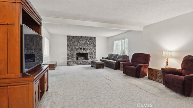 5427 Picker St, Riverside, CA 92503 - living room with a fireplace, light carpet, beamed ceiling, and a textured ceiling