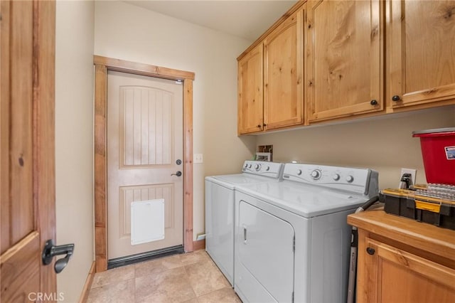 61465 Latham Trl, Joshua Tree, CA 92252 - clothes washing area featuring separate washer and dryer, cabinet space, and baseboards