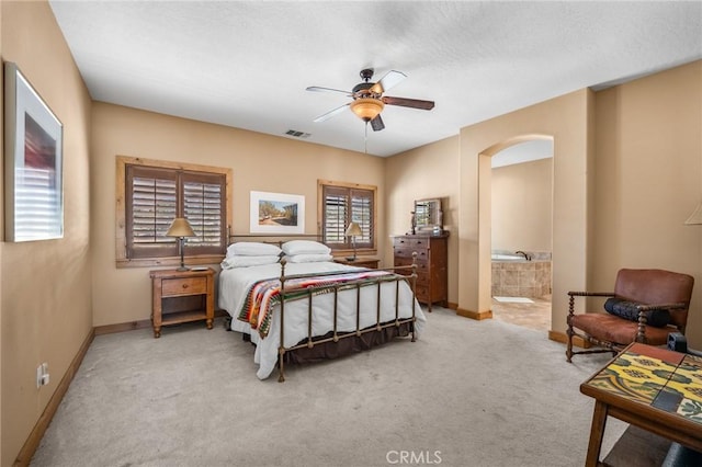 61465 Latham Trl, Joshua Tree, CA 92252 - bedroom featuring carpet floors, baseboards, and arched walkways