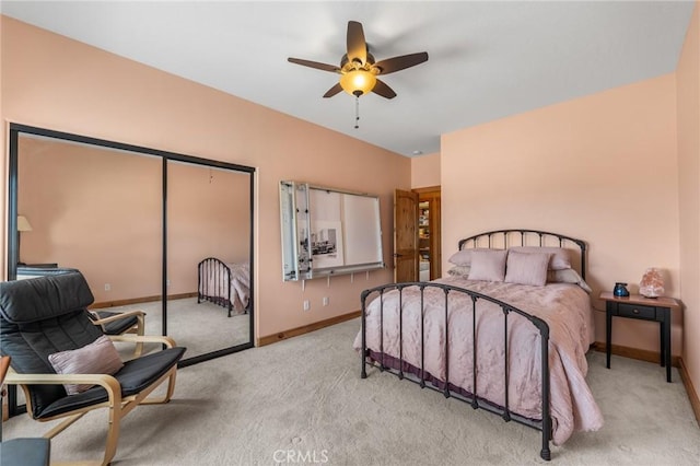 61465 Latham Trl, Joshua Tree, CA 92252 - carpeted bedroom featuring baseboards, a closet, and a ceiling fan