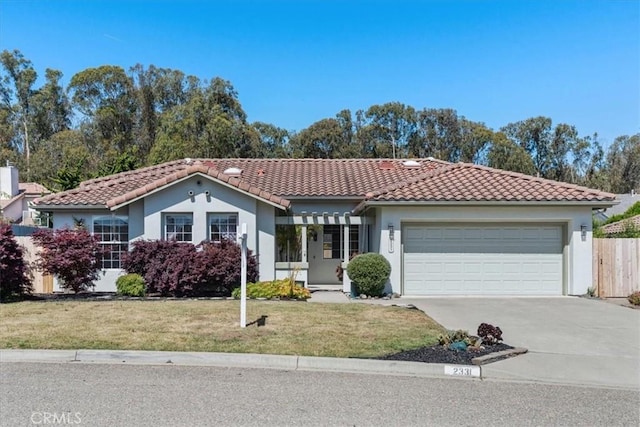 2331 Humboldt St, Los Osos, CA 93402 - mediterranean / spanish home featuring a tile roof, stucco siding, driveway, and an attached garage