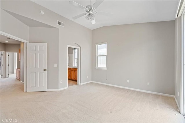 2331 Humboldt St, Los Osos, CA 93402 - unfurnished bedroom with light colored carpet, baseboards, vaulted ceiling, and connected bathroom