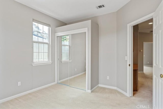2331 Humboldt St, Los Osos, CA 93402 - unfurnished bedroom featuring light carpet, a closet, and baseboards