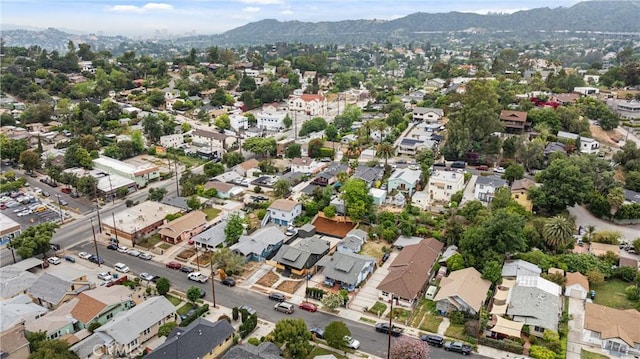 drone / aerial view featuring a mountain view and a residential view