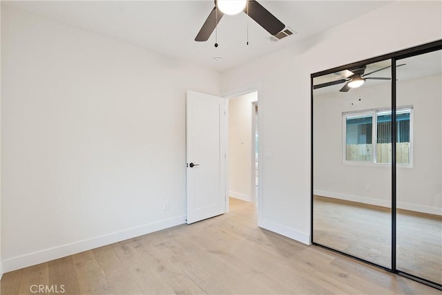 6123 Tipton Way, Los Angeles, CA 90042 - unfurnished bedroom with a closet, light wood-style flooring, baseboards, and ceiling fan