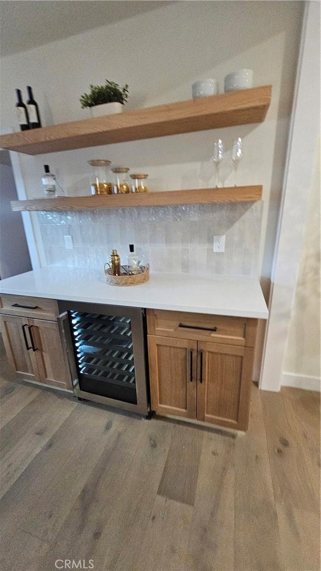6123 Tipton Way, Los Angeles, CA 90042 - indoor dry bar with light wood-style floors and wine cooler