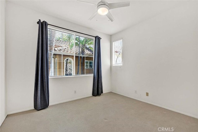 2516 Lewis Dr, Tustin, CA 92782 - unfurnished room with carpet floors, baseboards, and a ceiling fan