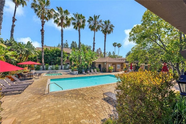 2516 Lewis Dr, Tustin, CA 92782 - community pool featuring a hot tub and a patio