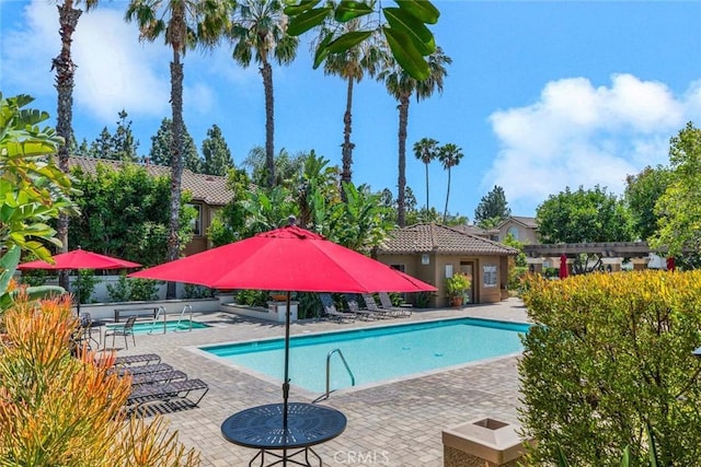 2516 Lewis Dr, Tustin, CA 92782 - community pool featuring a patio area